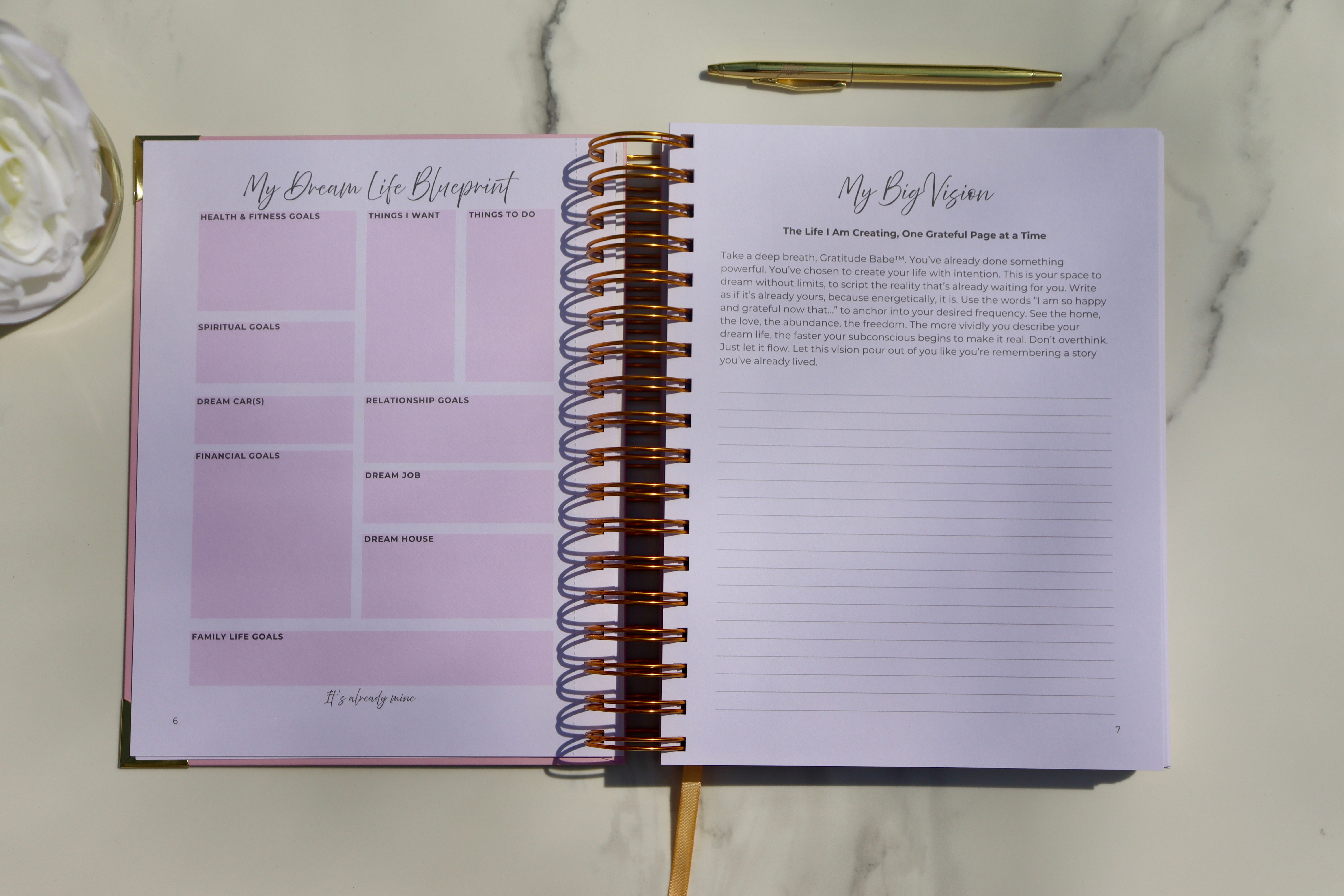 Gratitude is Yummy Journal open to a vision board and manifestation planning page with gold spiral binding